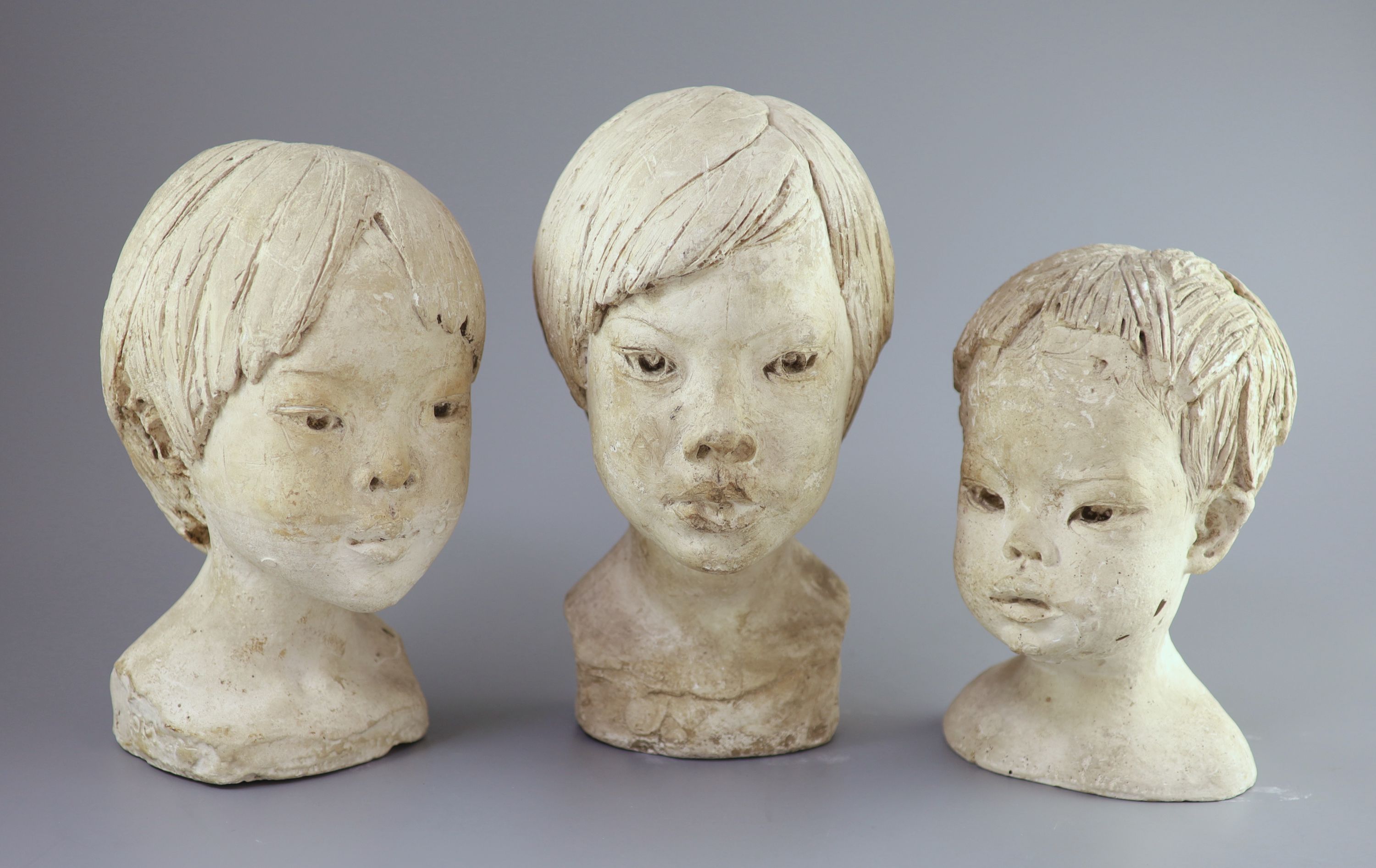 Barbara Tribe (1913-2000), , Three plaster head studies of children, largest 32cm